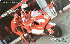 Ducati GP4 e il suo team - L. Capirossi (€ 5)