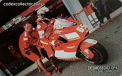 Ducati GP4 e il suo team - L. Capirossi (€ 5)