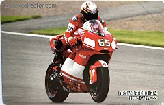 Ducati GP4 e il suo team - L. Capirossi (€ 5)