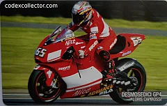 Ducati GP4 e il suo team - L. Capirossi (€ 5)