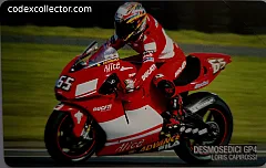 Ducati GP4 e il suo team - L. Capirossi (€ 5)